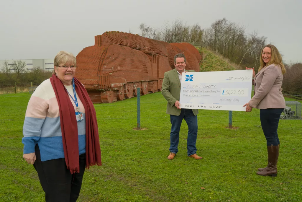 Presenting charity cheque