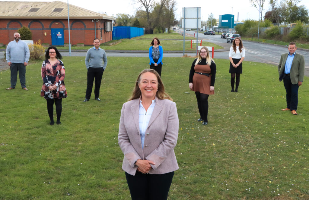 HR2day team stood on grass