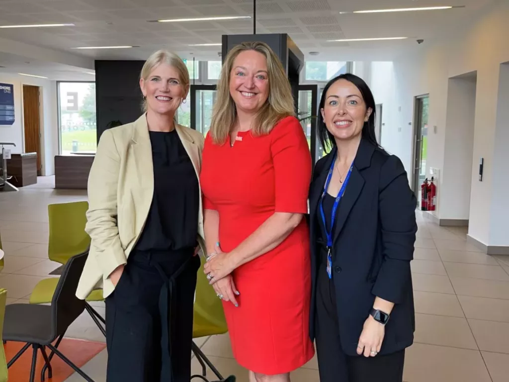 Nicky Jolley stood with two representatives from the Power of Women